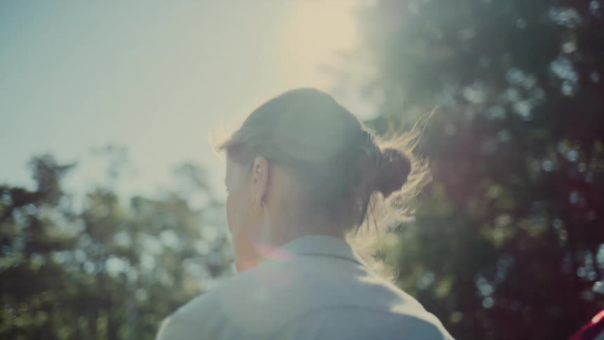 Woman walking in an outdoor environment