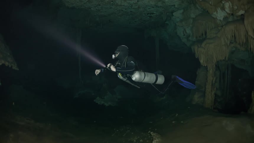 Diver inside an aquatic cave