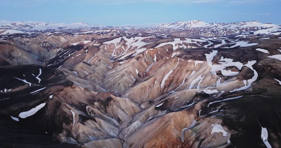 Aerial panorama of mountains with reliefs and snow