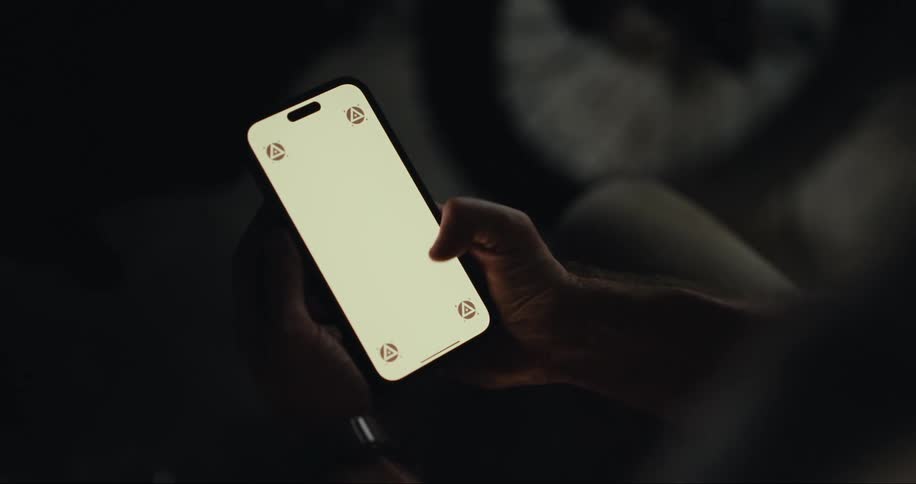 Persons hand using a smartphone
