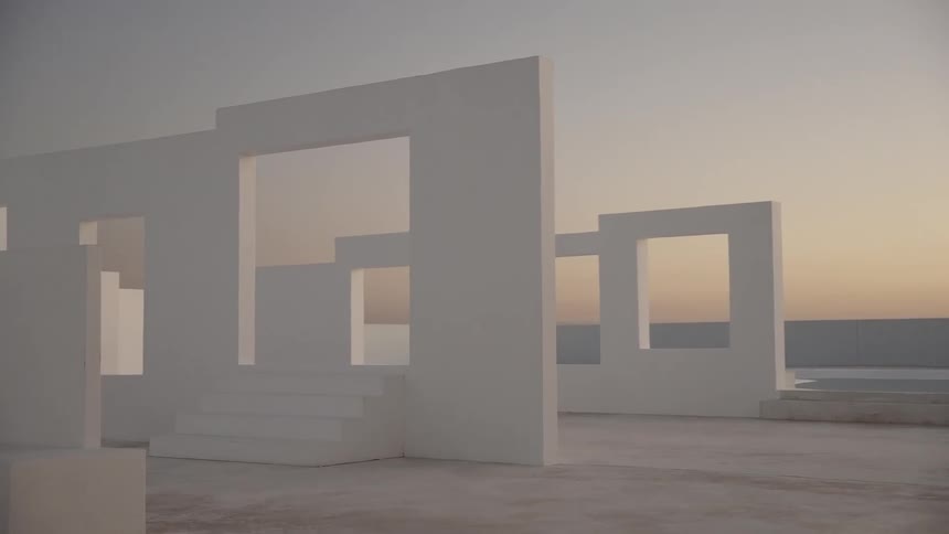 White square structures with doorways