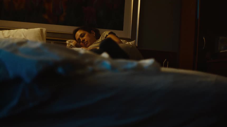 Woman lying in bed sleeping