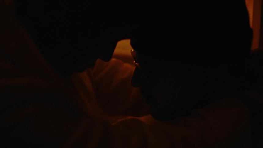 Two people touch foreheads