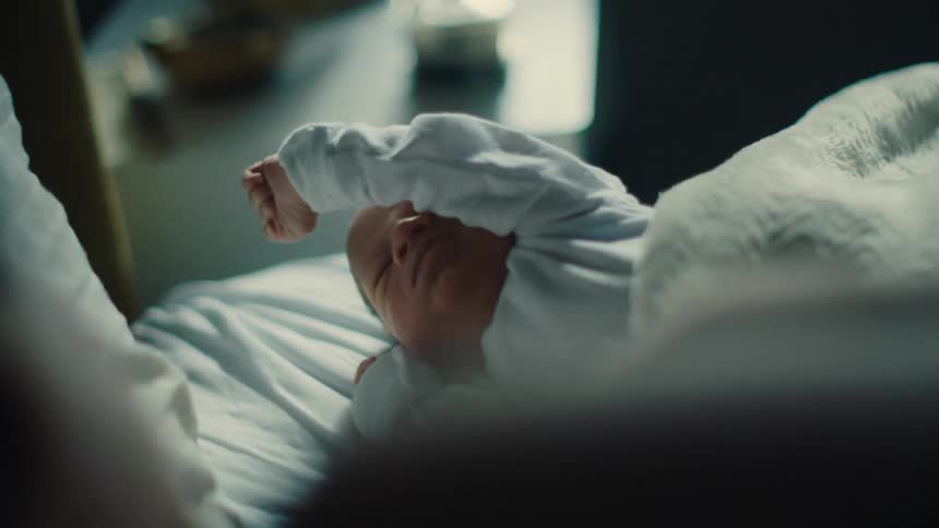 Newborn baby stretching