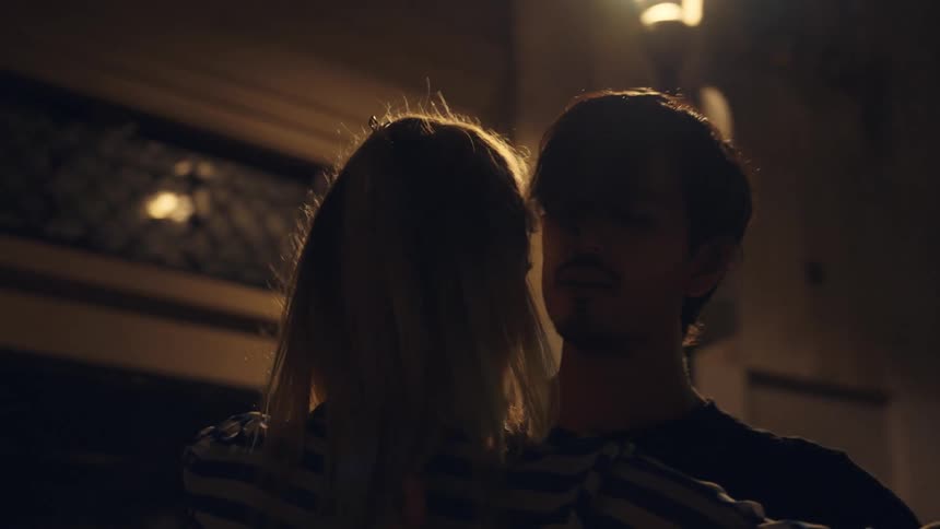 A couple hold eachother close