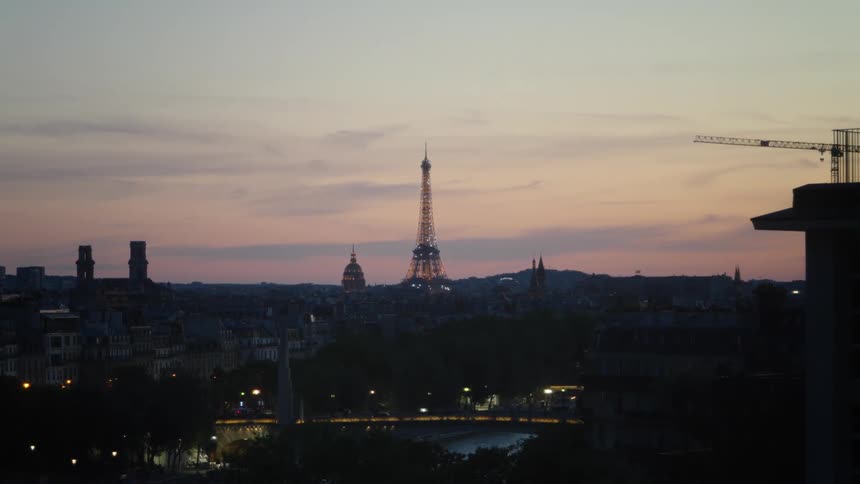 Lights flash on the eiffel tower in paris