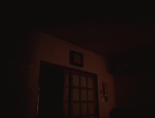 Interior of a house with lights reflecting on the walls
