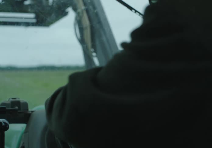 Person driving an agricultural machine