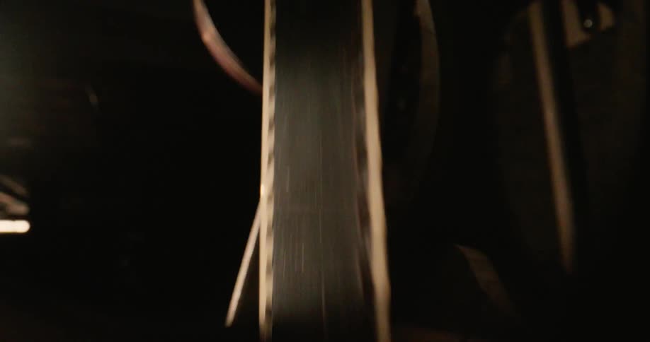 Old movie player with a moving tape