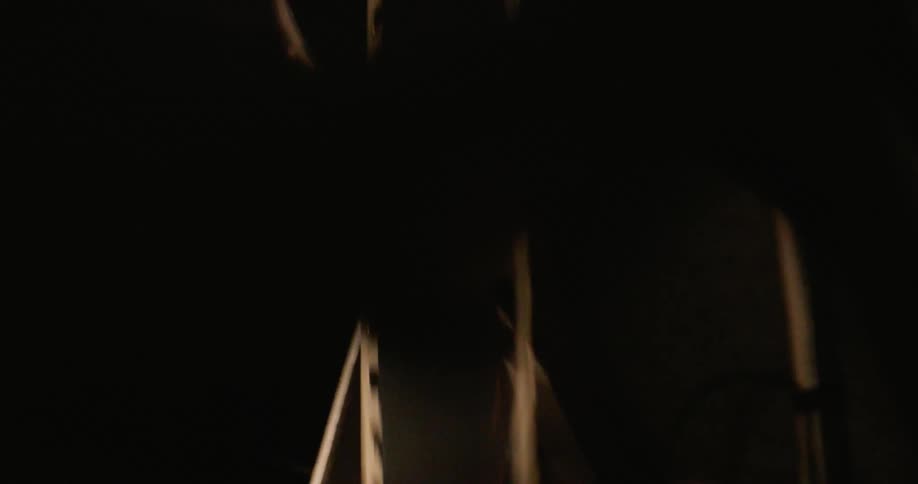A film strip flaps around as the projector continues to operate