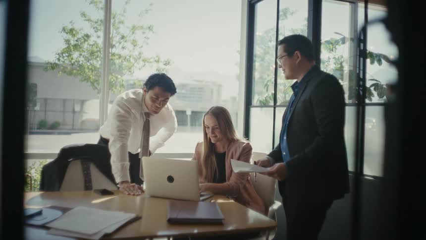 Coworkers collaborate during a meeting at the office