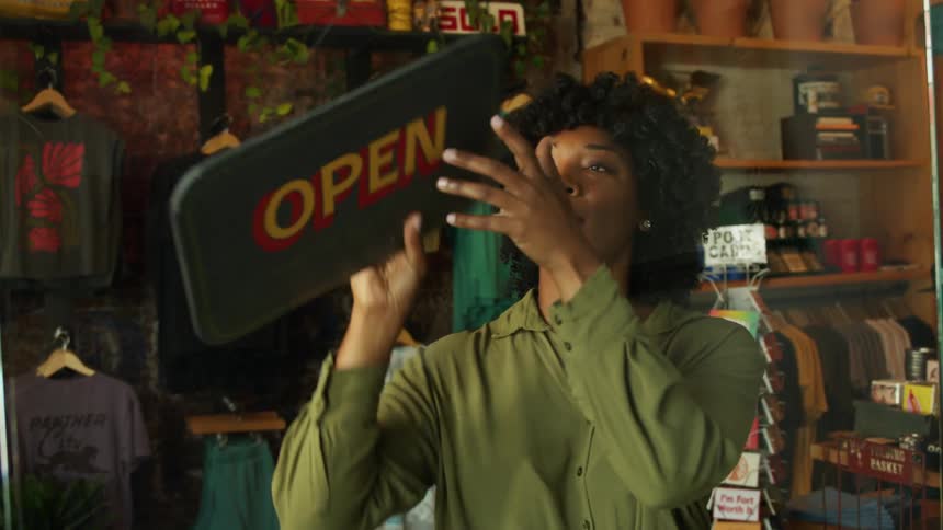 The worker opens the shop