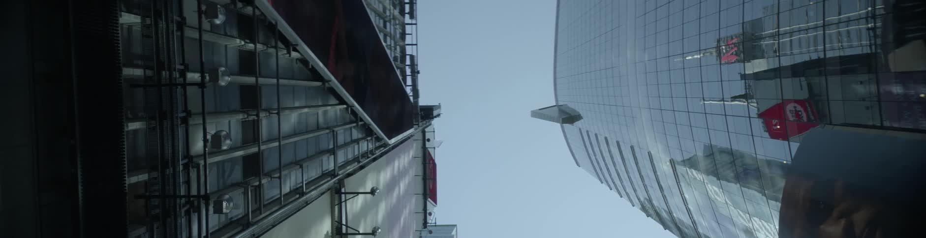 Looking straight up between two buildings
