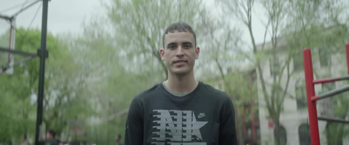Man standing outside and smiling