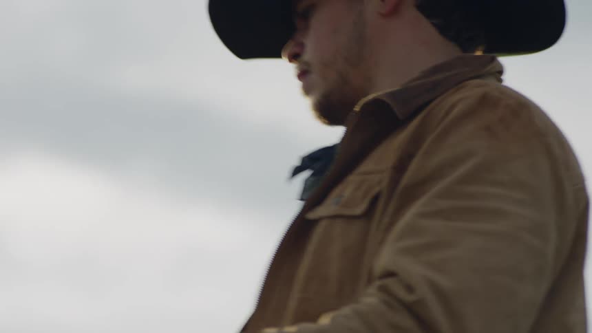 A man rides by on his horse