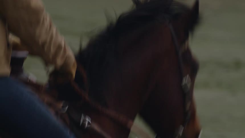 A man is horseback riding