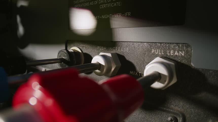 Pilot manipulates aircraft by pulling switches on its control panel