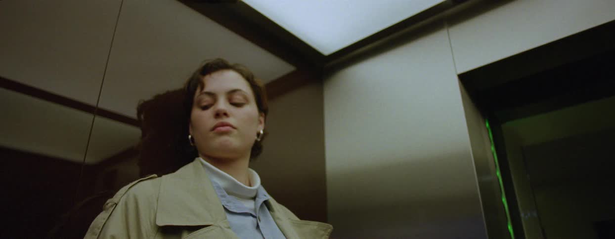 Portrait of a woman inside an elevator