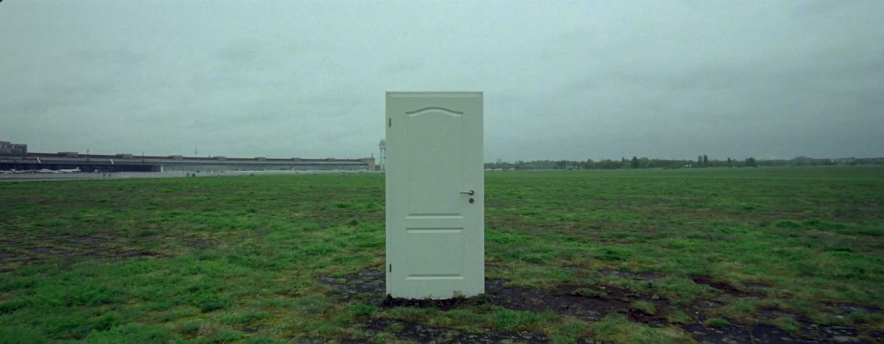 White door in a field