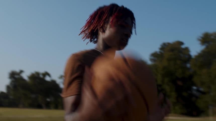 Two men are playing basketball