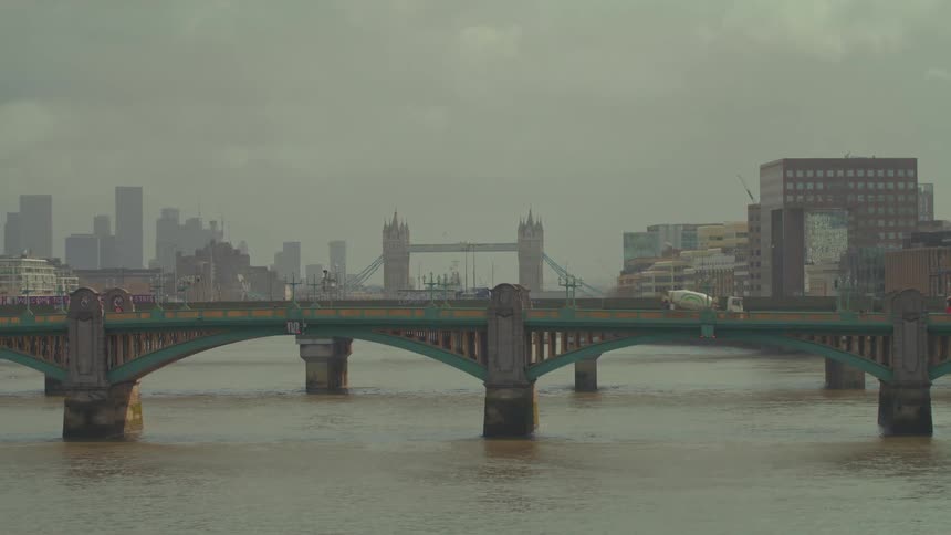 Trucks travel over the bridge