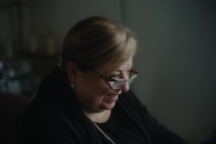 Woman sitting smiling