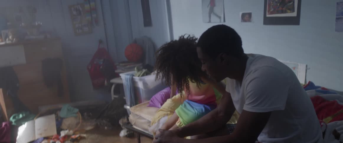 A man wakes his sister up