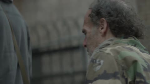 A man walks on a city street