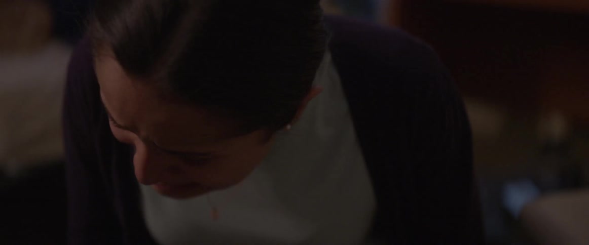 A young woman sobbing