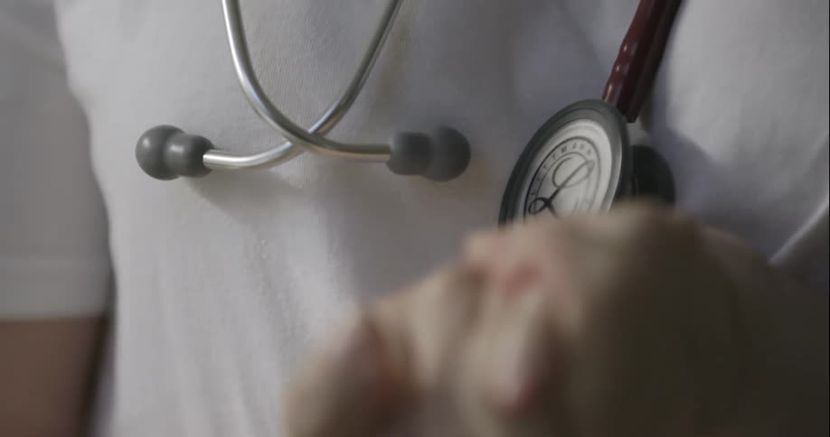 A medical worker wearing a stethoscope