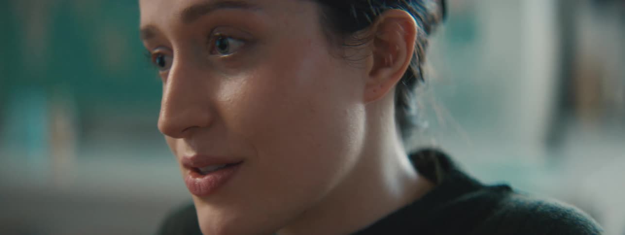 A woman is talking to someone