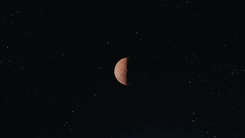 Half of a planet visible against a starry space