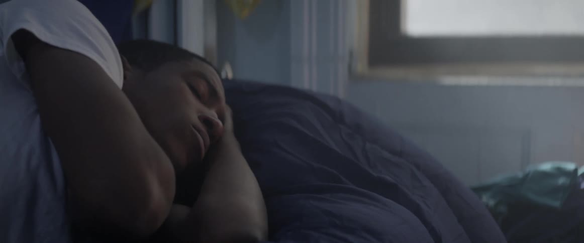 A man turns in his sleep