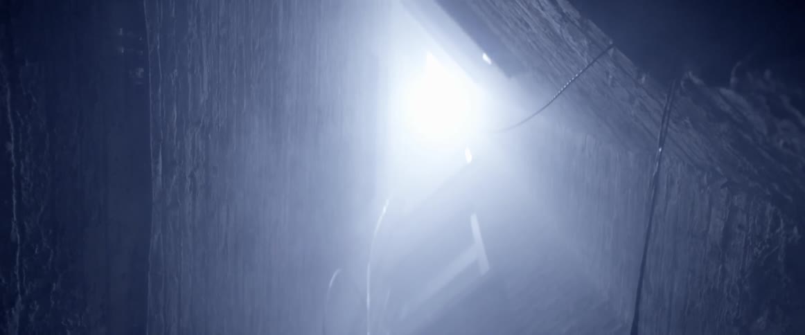 Sunlight shines through a hole in the ceiling
