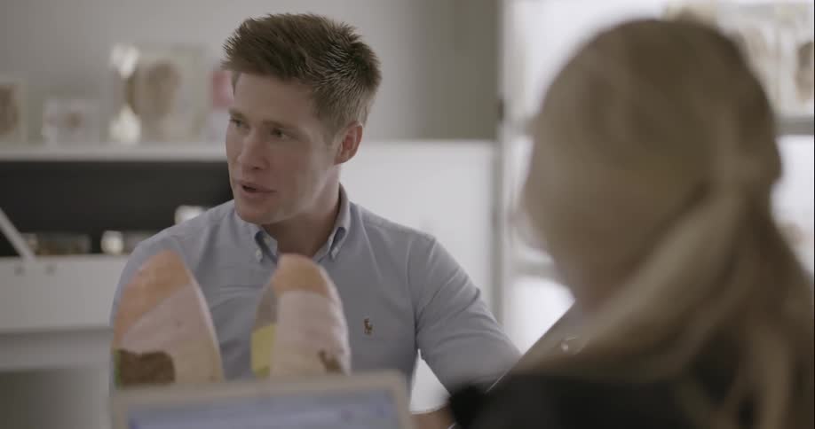 Man talking to someone in a classroom