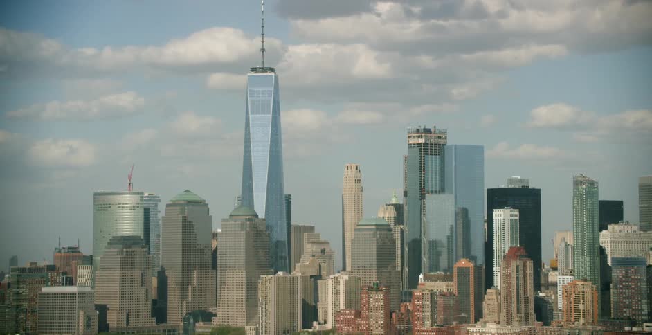 Clouds pass over a city skyline
