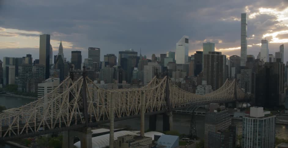 A city skyline being filmed from the air