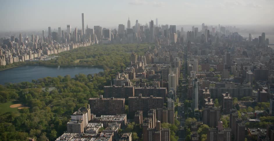 City buildings and skyscrapers surround central park