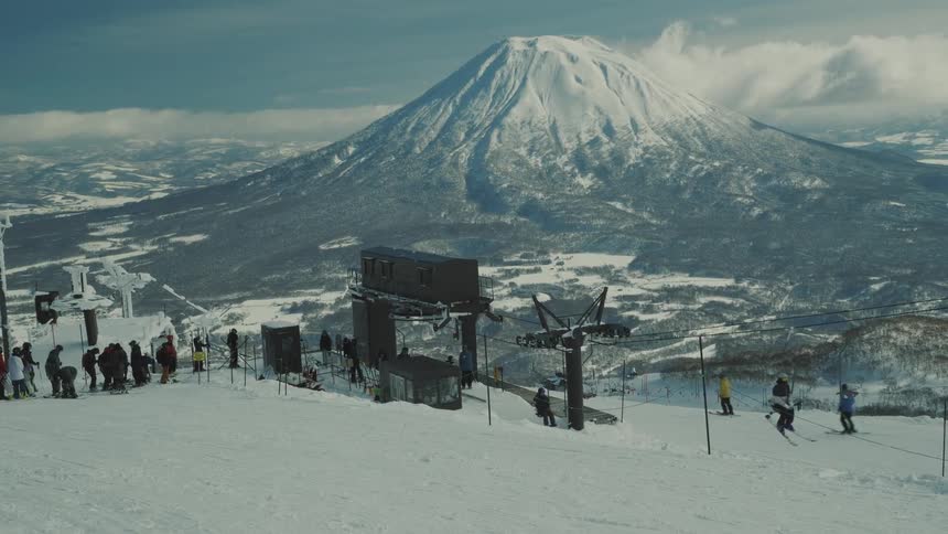 People are skiing on the slope