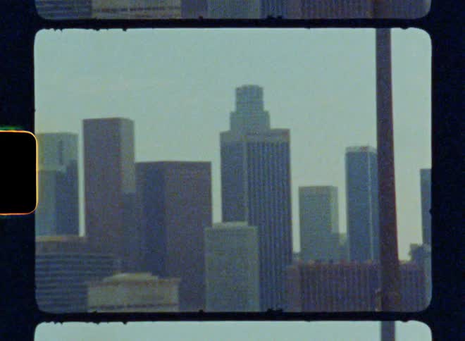 Moving view of a metropolis with skyscrapers in the background