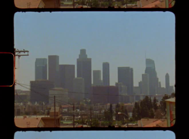 Residential neighborhood of an urban city and in the background a metropolis with skyscrapers