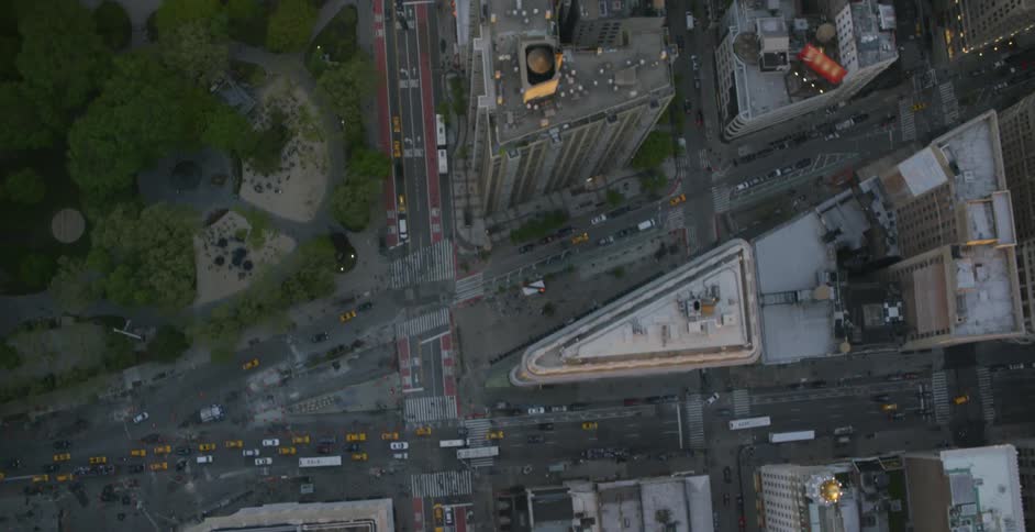 Moving aerial view of a large city as seen from directly overhead