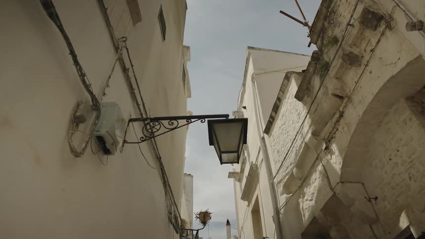 Closeup of an exterior lamp on an apartment building