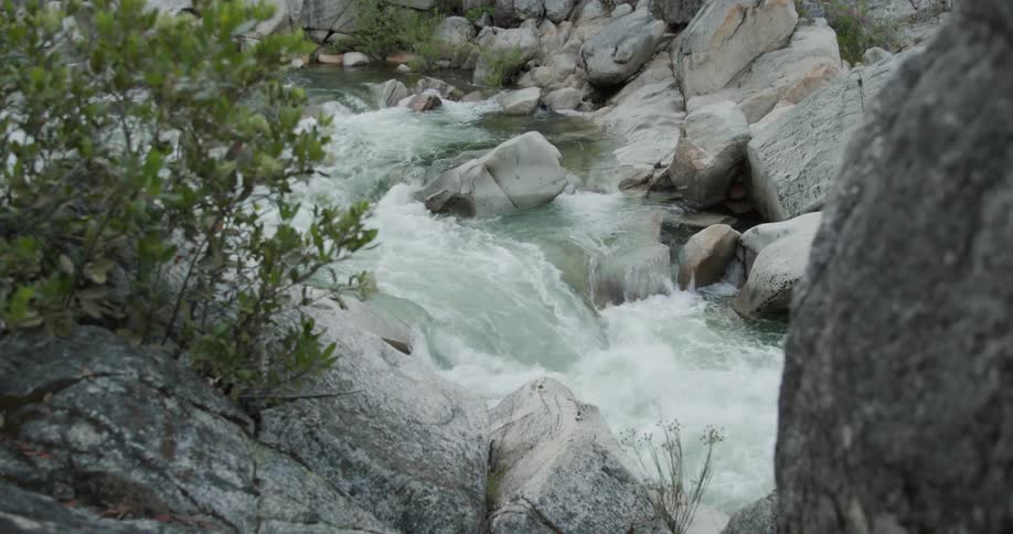 Water flowing through river rapids