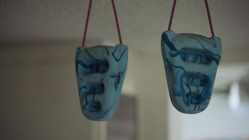 Blue marble clay artwork hanging from the ceiling