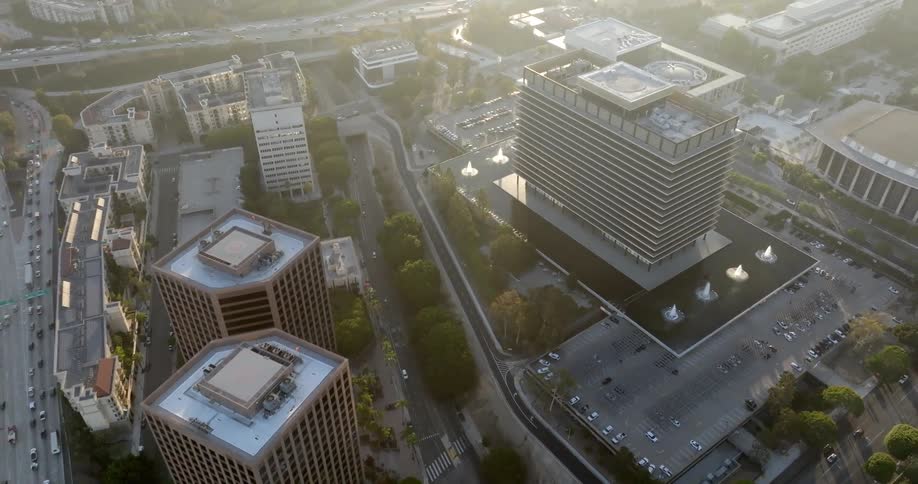 Aerial of tall buildings and highway traffic in a metropolis
