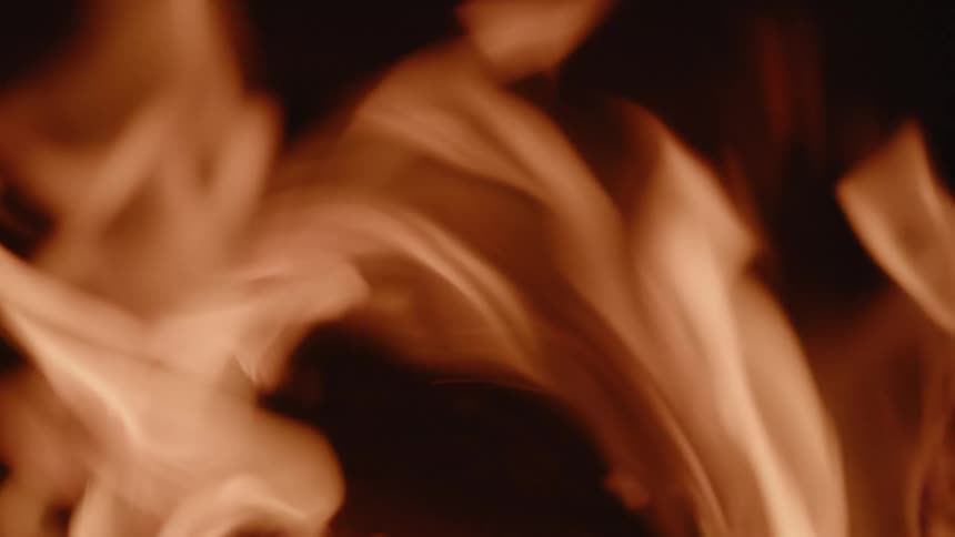Close up of embers with fire rising
