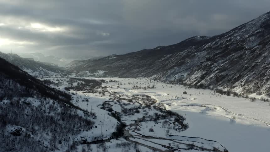 The landscape is covered in snow