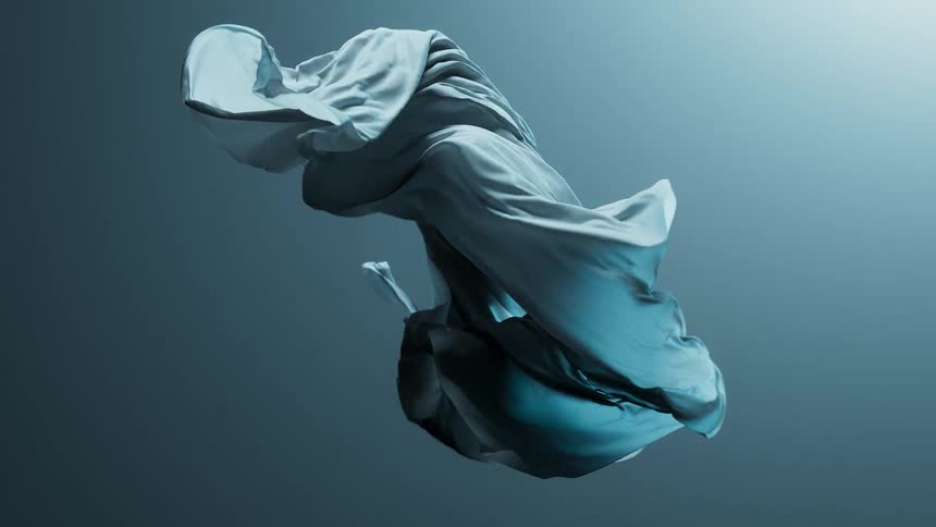 Blue fabric floating in mid air with dynamic folds and twists against a solid grey background