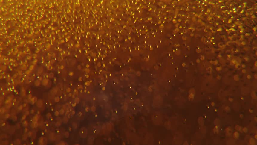 Gas bubbles moving inside beer